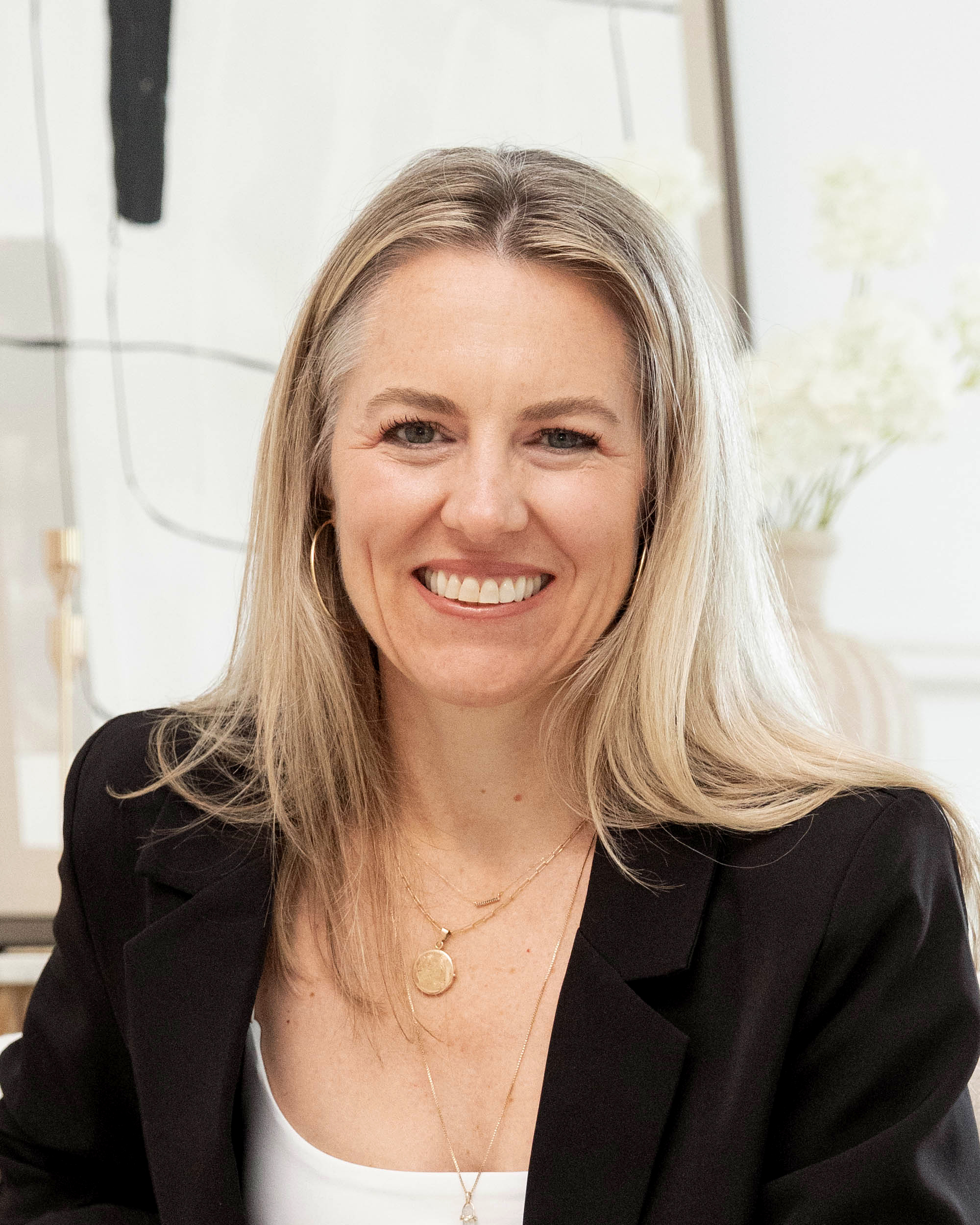 Jocelyn Pepe smiling in a warm portrait